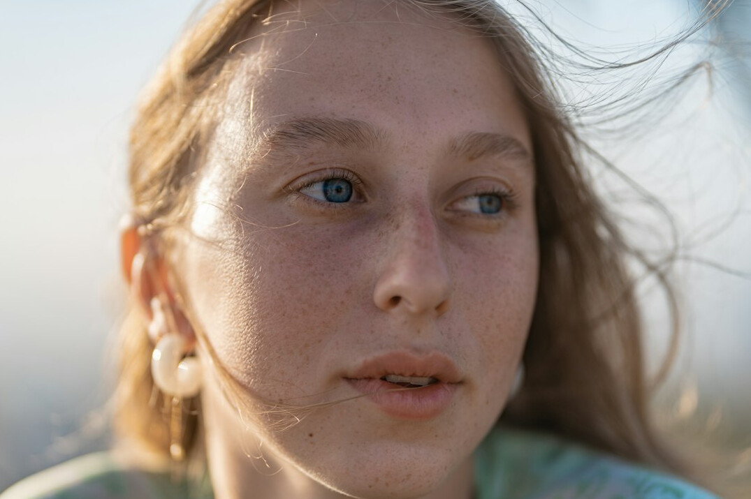 Portrait of a young woman looking at camera